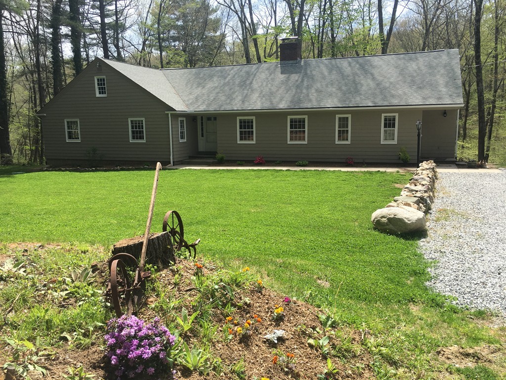3333 Diamond Hill Road Cumberland, RI 02864 - Photo 1 of 29 a brick house with a big yard and potted plants