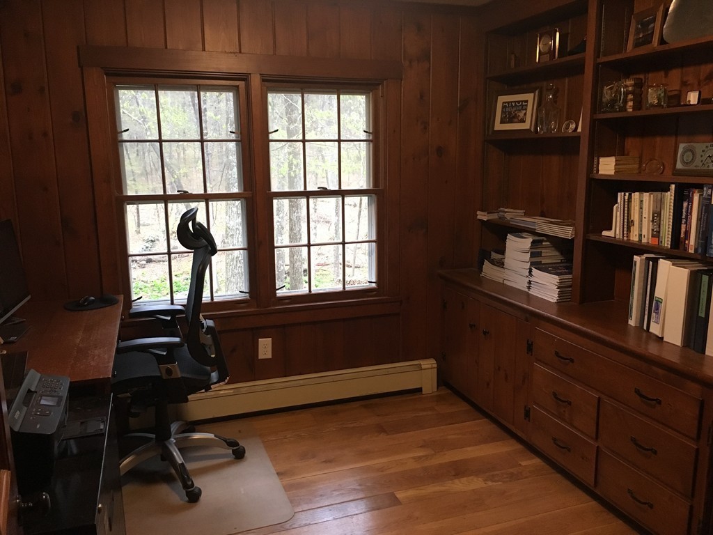 3333 Diamond Hill Road Cumberland, RI 02864 - Photo 11 of 29 a living room with hard wood floors and a window