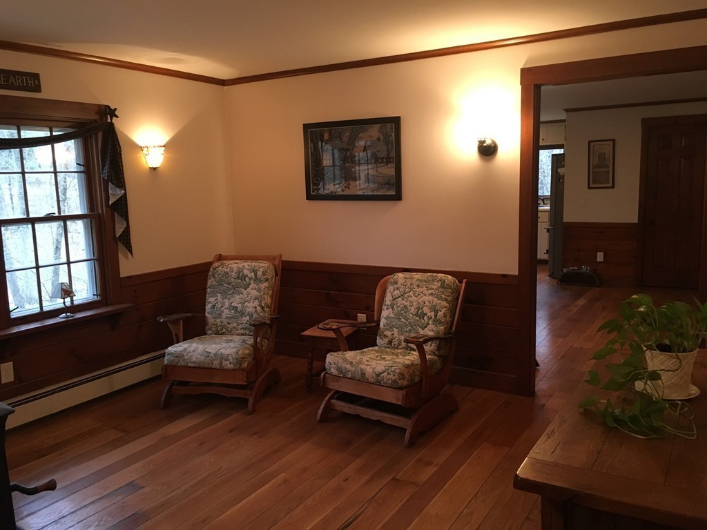 3333 Diamond Hill Road Cumberland, RI 02864 - Photo 15 of 29 a living room with furniture and a window