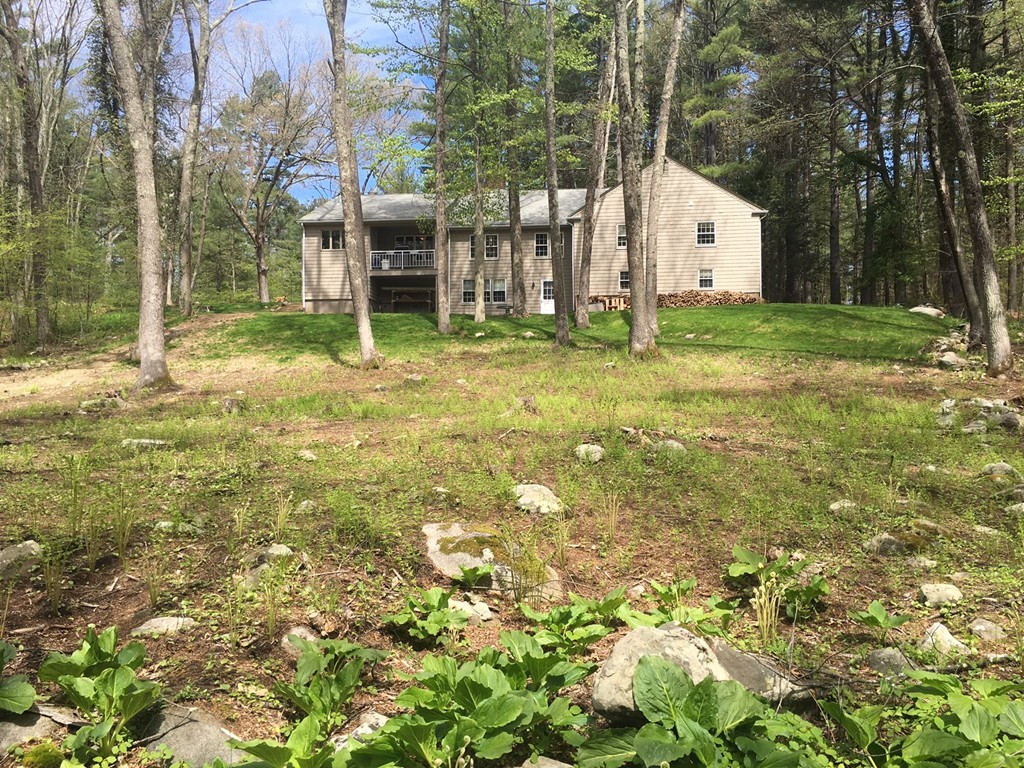 3333 Diamond Hill Road Cumberland, RI 02864 - Photo 4 of 29 a view of a house with yard and tree s
