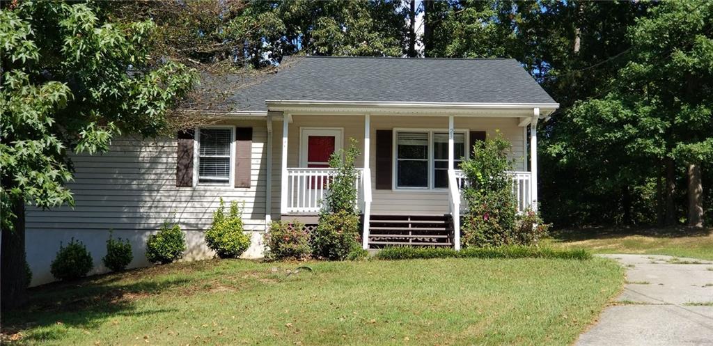 23 Jeffery Lane Northeast Cartersville, GA 30121 - Photo 1 of 1 front view of a house with a yard