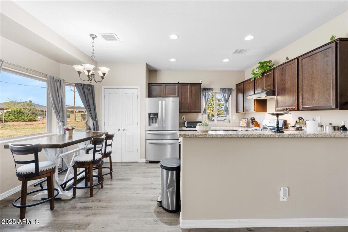 8191 East Gale Road Prescott Valley, AZ 86314 - Photo 8 of 28 DINING AREA OPEN TO KITCHEN