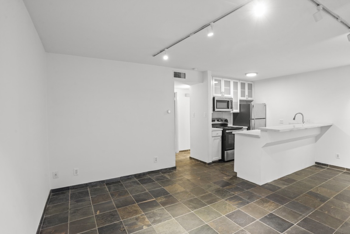 3602 Garrott Street, Unit 7 Houston, TX 77006 - Photo 15 of 34 Another view of the open living, dining and kitchen.