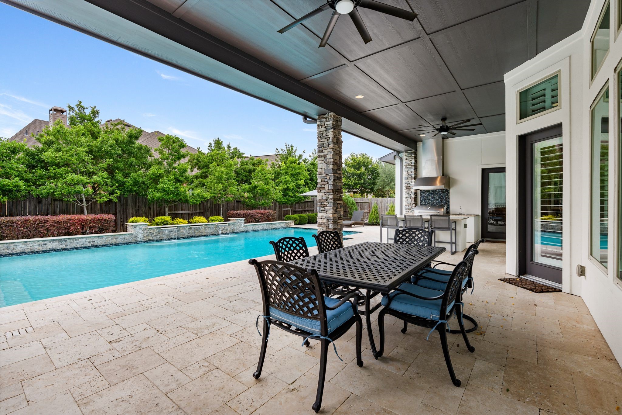 2926 Fairmont Ridge Lane Katy, TX 77494 - Photo 3 of 49 a view of a patio with a table chairs and a yard
