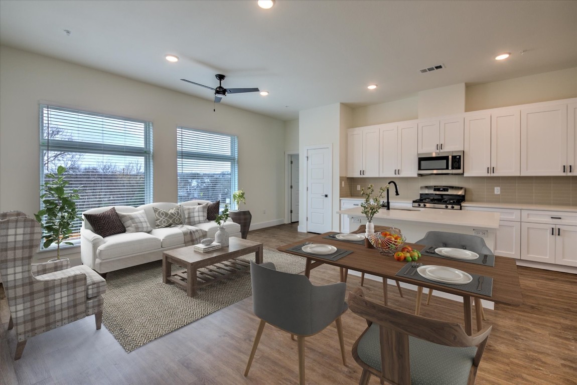Welcome to Unit 1201 of the East Grove Condominiums, located in the heart of eclectic 78721. Virtually staged.