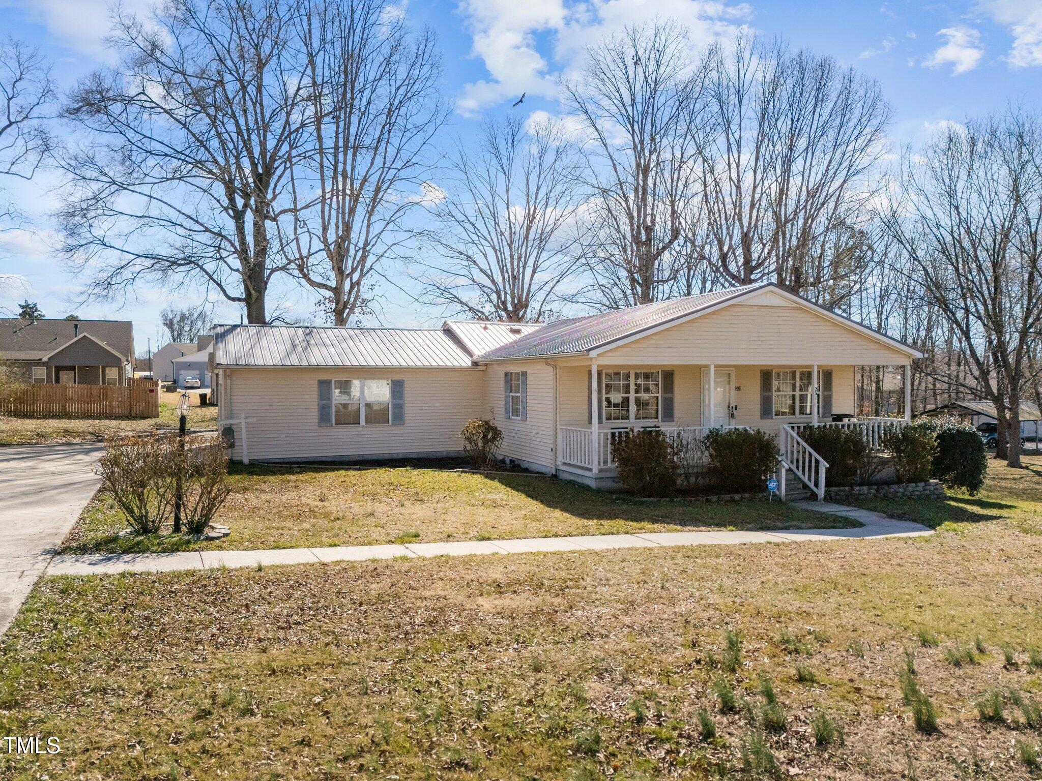 231 Patterson Drive Roxboro, NC 27573 - Photo 8 of 43 6-web-or-mls-DJI_20250228135637_0022_D
