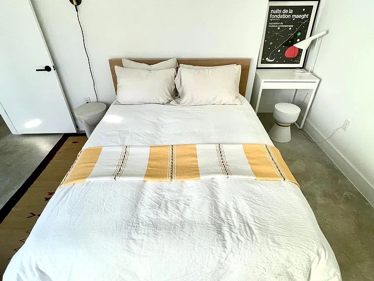 910 Gullett Street, Unit 2 Austin, TX 78702 - Photo 16 of 19 Bedroom with baseboards