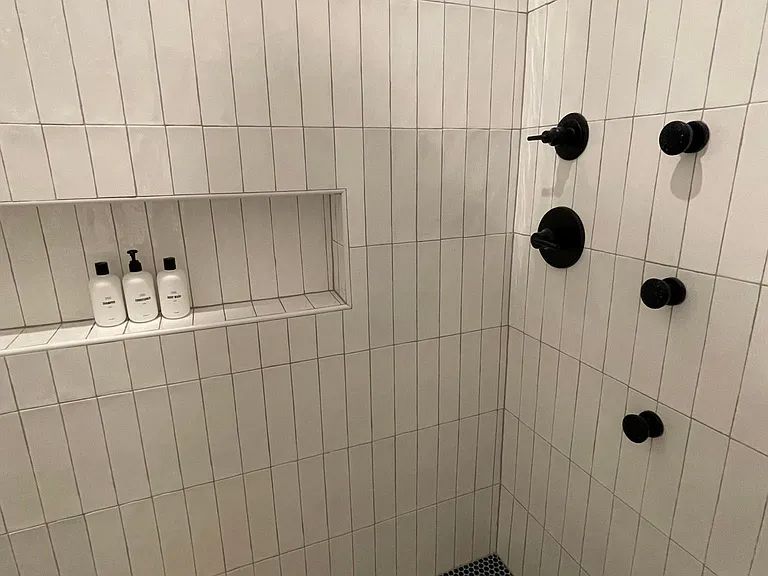 910 Gullett Street, Unit 2 Austin, TX 78702 - Photo 19 of 19 Full bath featuring a tile shower