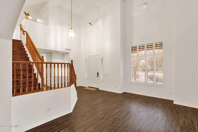 a view of entryway with wooden floor