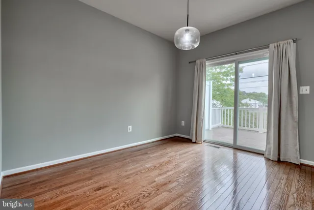 a kitchen with a stove a sink and a microwave