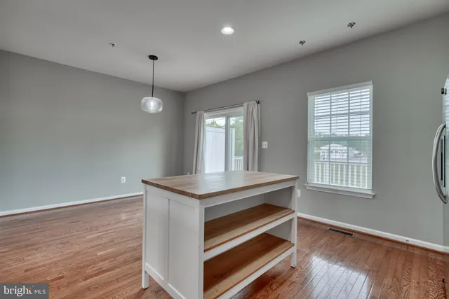 a view of balcony with furniture and garden
