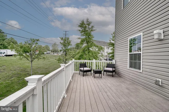 a view of an empty room and closet area