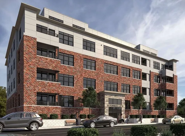 a front view of a building with street view