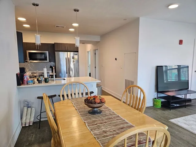 a view of a dining room with furniture