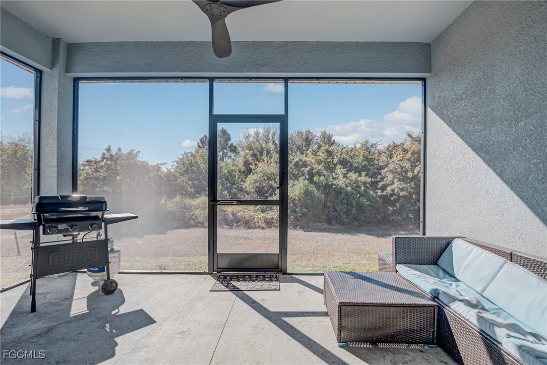 3309 30th Street Southwest Lehigh Acres, FL 33976 - Photo 20 of 28 a bedroom with furniture and a window