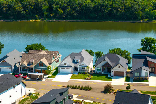 305 Leeward Way Ottawa, IL 61350 - Photo 11 of 53 an aerial view of a house with swimming pool patio and lake view