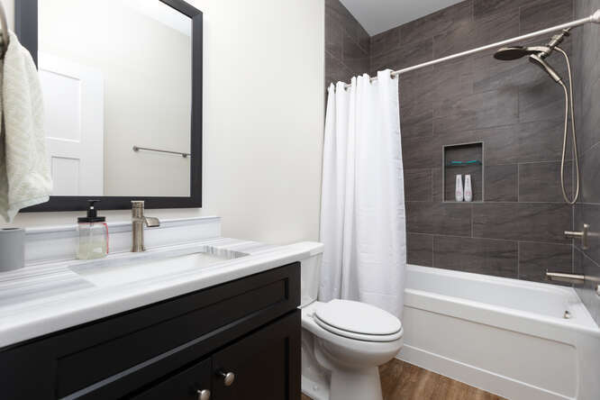305 Leeward Way Ottawa, IL 61350 - Photo 17 of 53 a bathroom with a sink a toilet and shower
