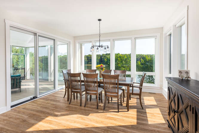 305 Leeward Way Ottawa, IL 61350 - Photo 30 of 53 a view of a dining room with furniture window and wooden floor