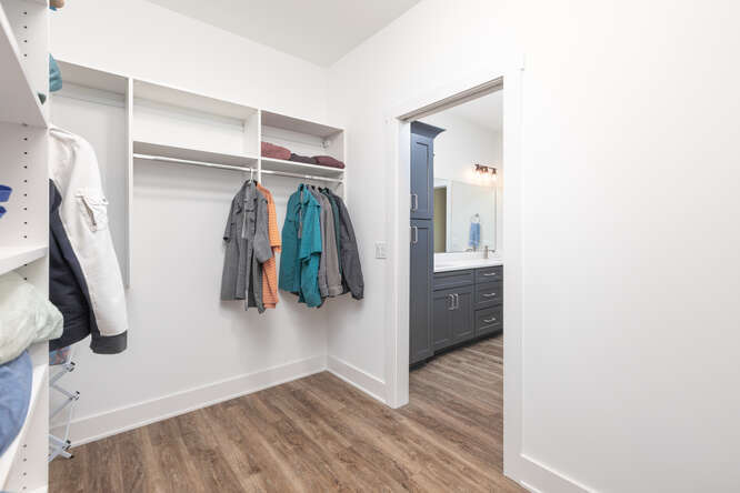 305 Leeward Way Ottawa, IL 61350 - Photo 38 of 53 a view of walk in closet with clothes and shoes