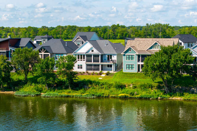 305 Leeward Way Ottawa, IL 61350 - Photo 6 of 53 a aerial view of a house with a garden and lake view