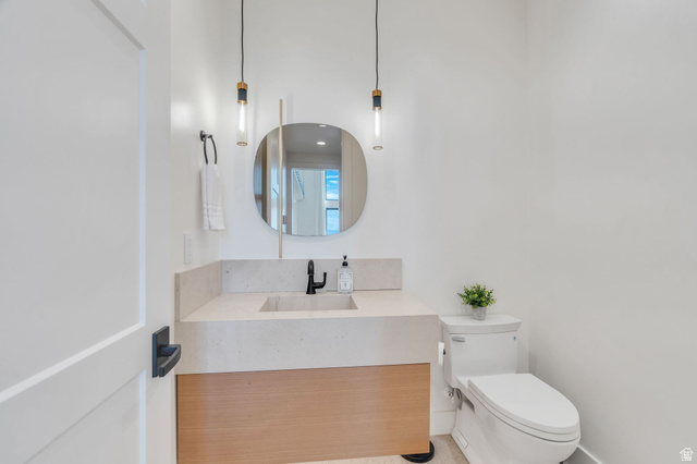 3918 South Mapleton Ests Drive Mapleton, UT 84664 - Photo 29 of 103 Half bathroom featuring toilet and vanity