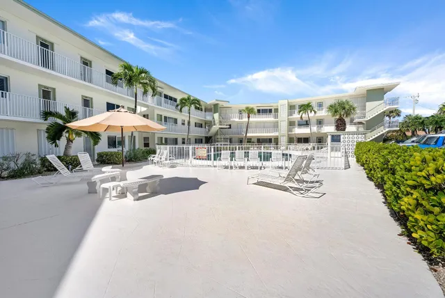 a view of outdoor space swimming pool and outdoor seating