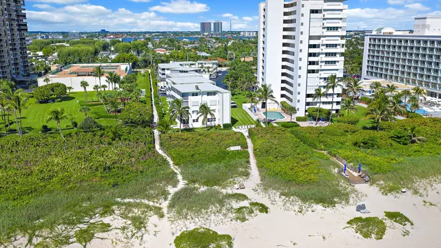 a view of a city with an ocean view