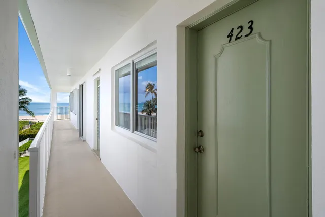a view of hallway with furniture