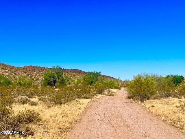 0 West Delores Road, Unit 173 & 174 Wittmann, AZ 85361 - Photo 6 of 7 a view of mountain view with mountains in the background