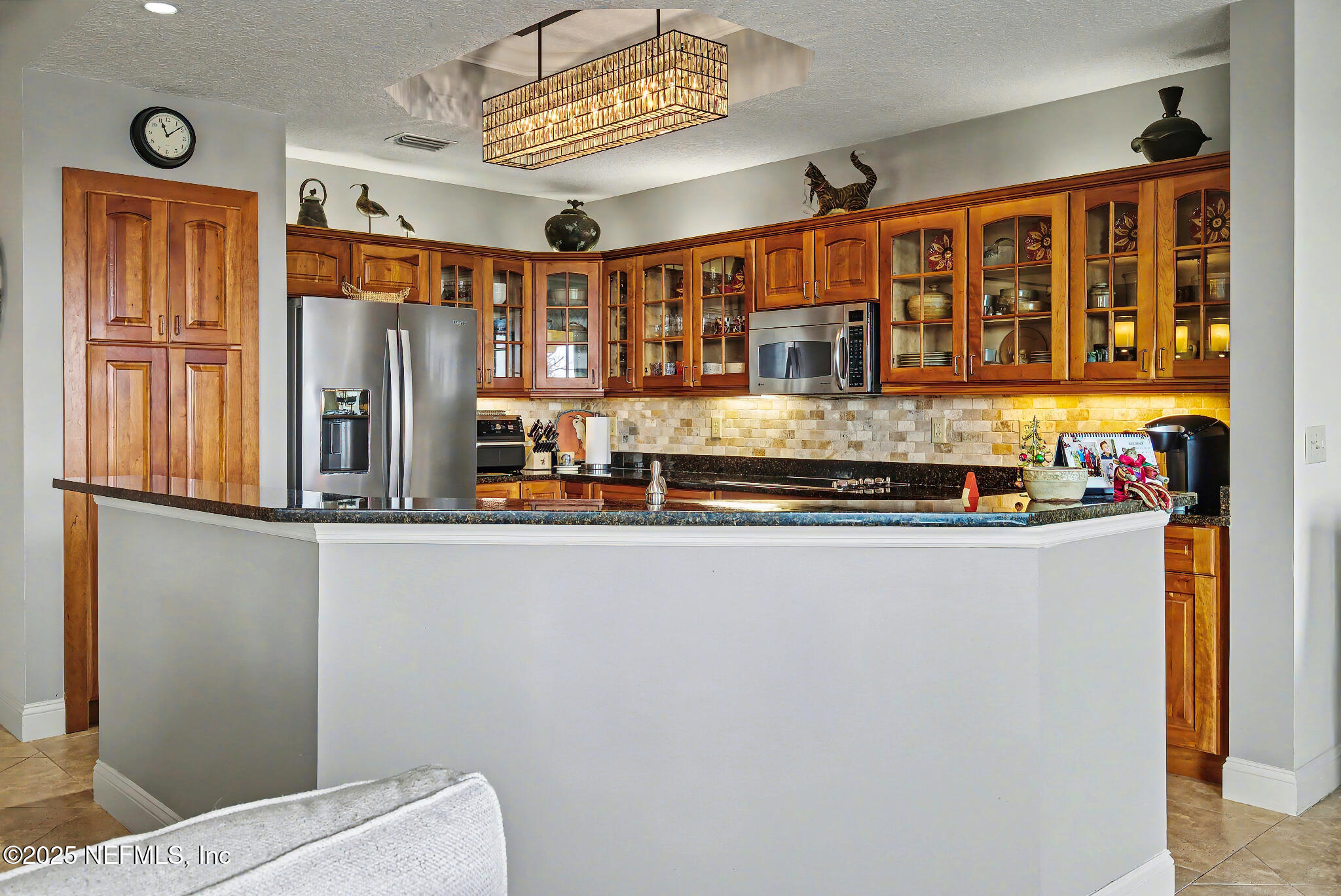1 Radio Road, Unit 203 St. Augustine, FL 32084 - Photo 12 of 57 a view of a refrigerator and a window