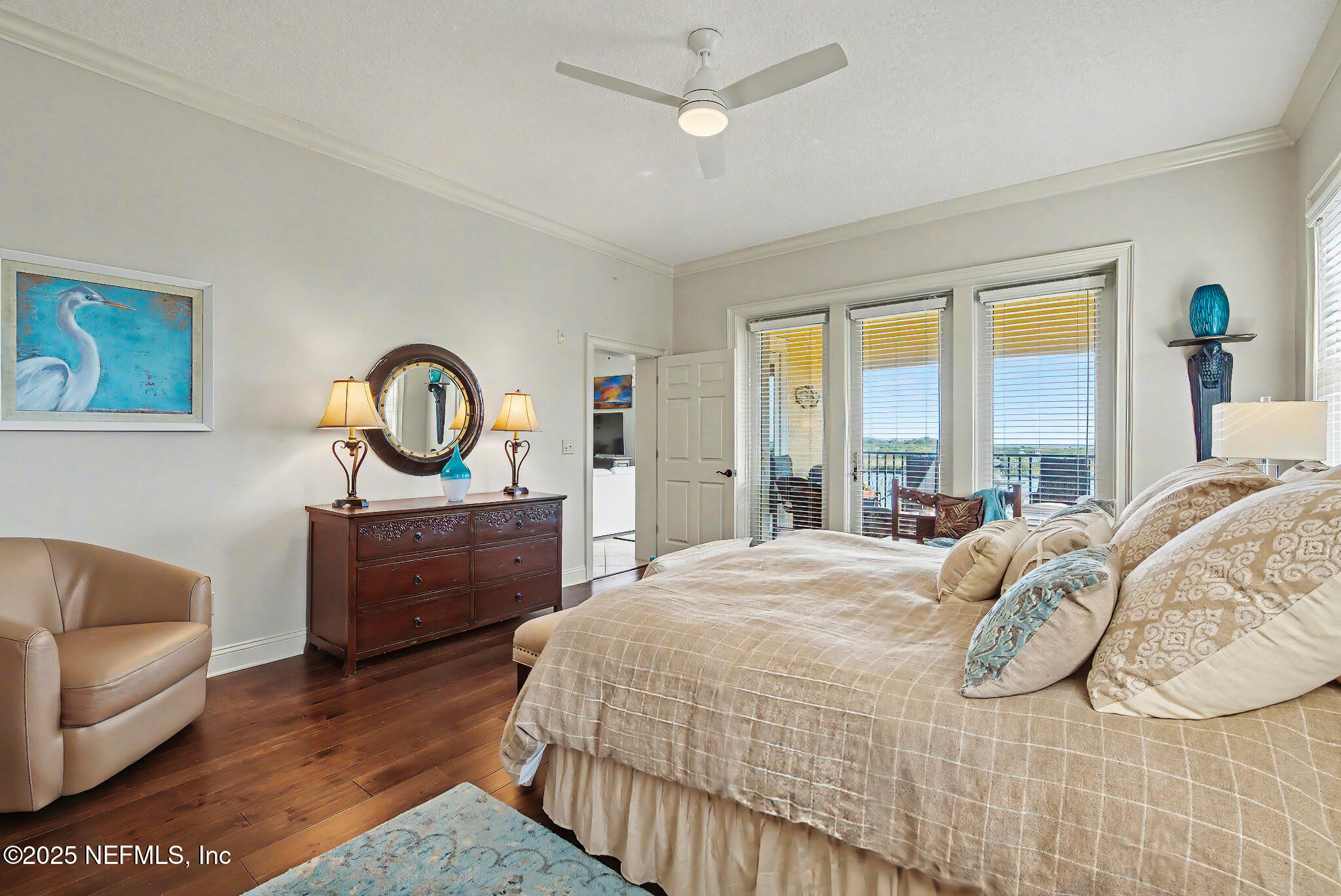 1 Radio Road, Unit 203 St. Augustine, FL 32084 - Photo 22 of 57 a bedroom with a large bed and a large window