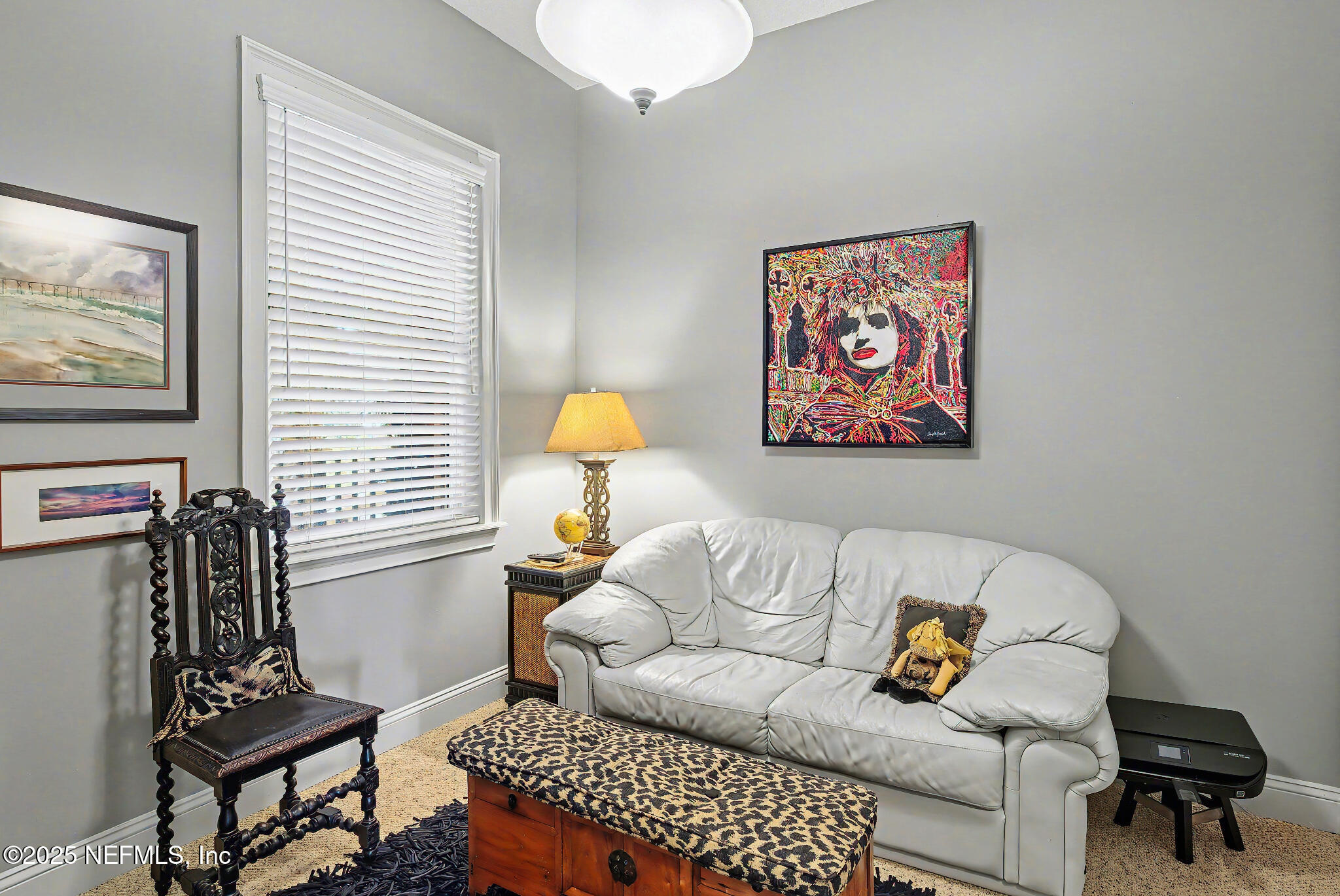 1 Radio Road, Unit 203 St. Augustine, FL 32084 - Photo 32 of 57 a living room with furniture and a window