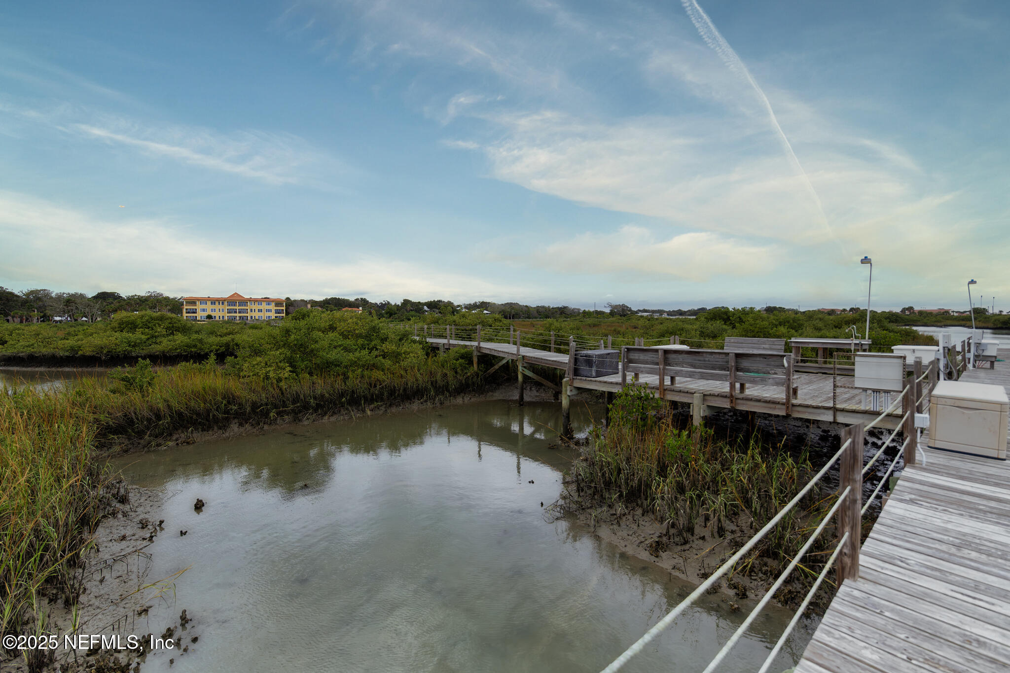 1 Radio Road, Unit 203 St. Augustine, FL 32084 - Photo 55 of 57 a view of a lake with a terrace