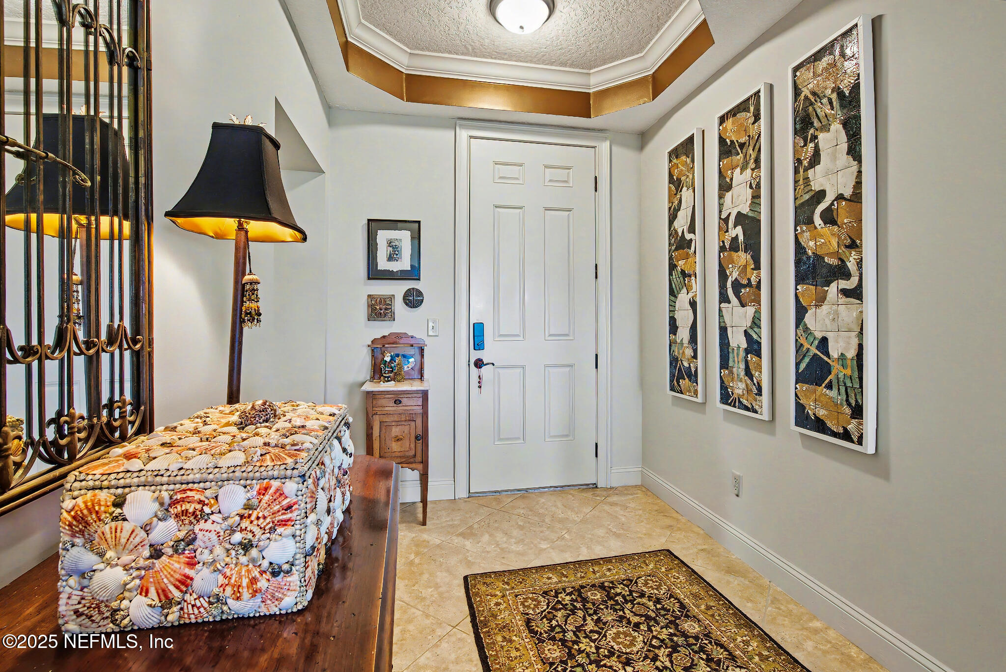 1 Radio Road, Unit 203 St. Augustine, FL 32084 - Photo 6 of 57 a bedroom with a bed and a lamp
