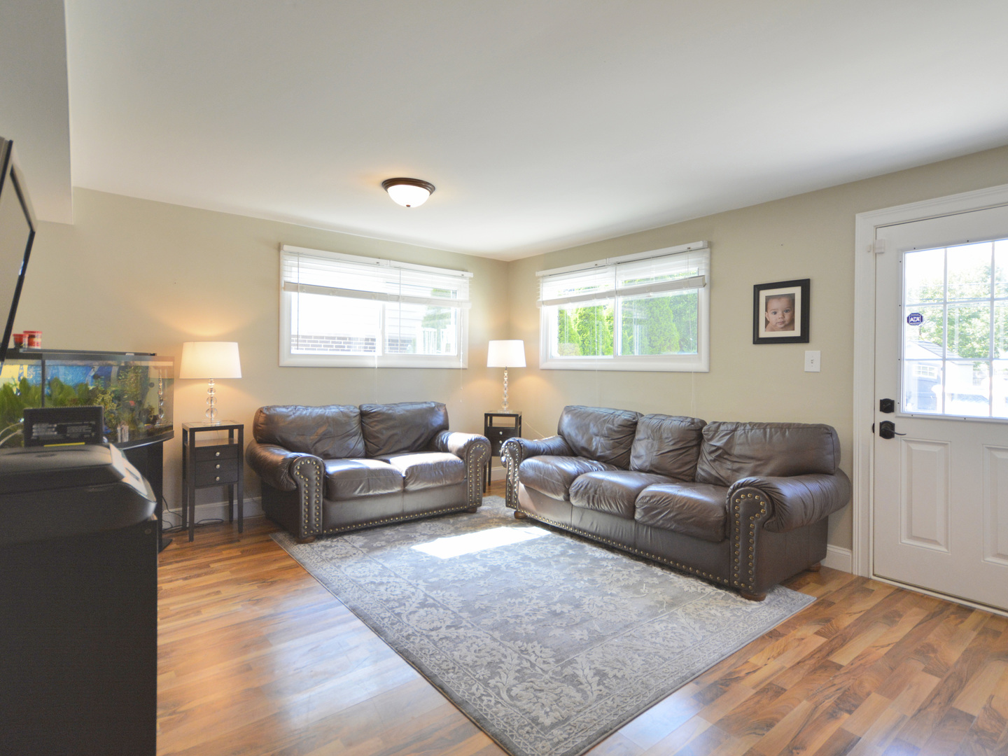 100 Ambleside Road Des Plaines, IL 60016 - Photo 11 of 15 a living room with furniture and a window
