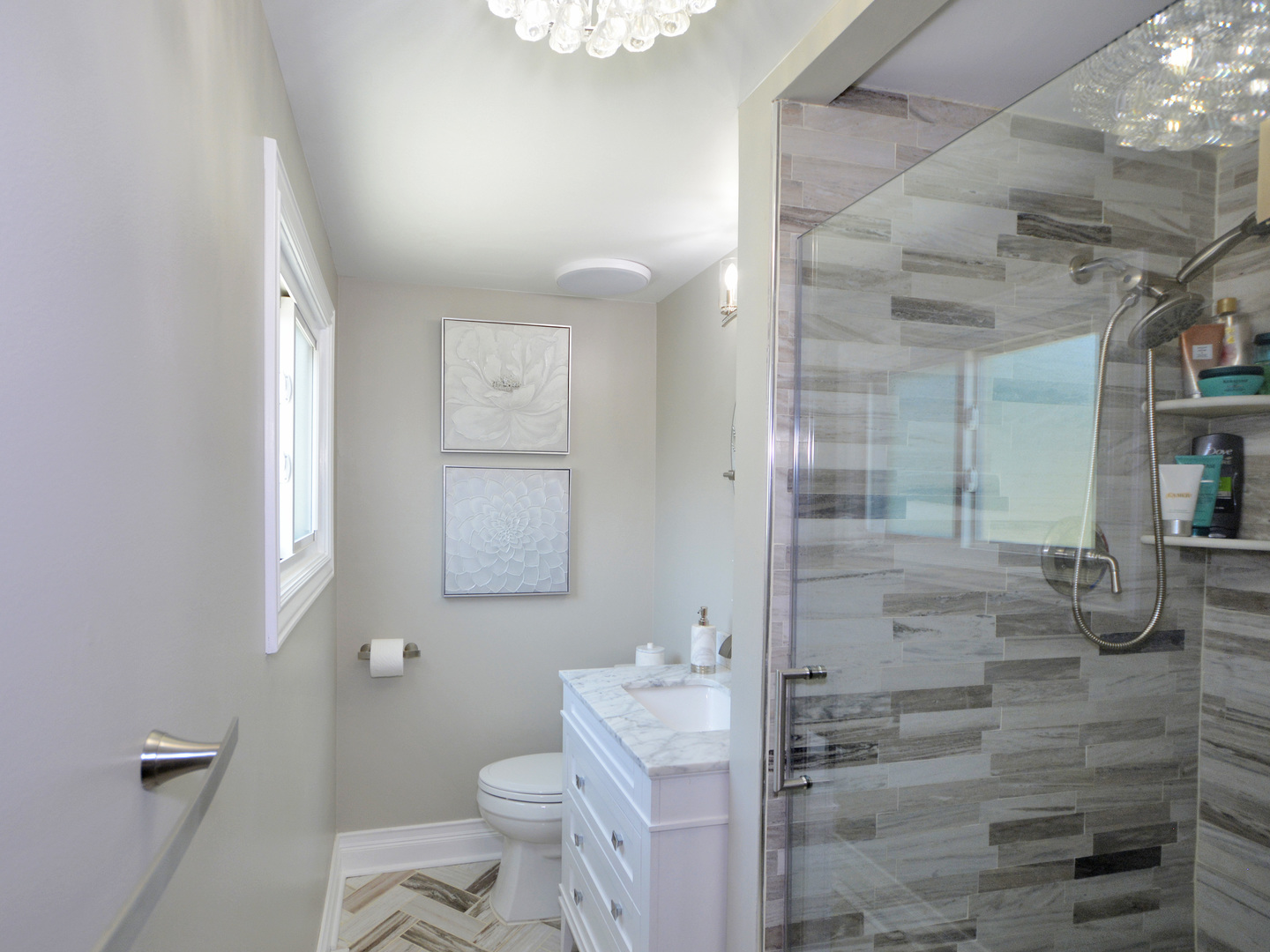 100 Ambleside Road Des Plaines, IL 60016 - Photo 7 of 15 a bathroom with a granite countertop sink mirror vanity and toilet