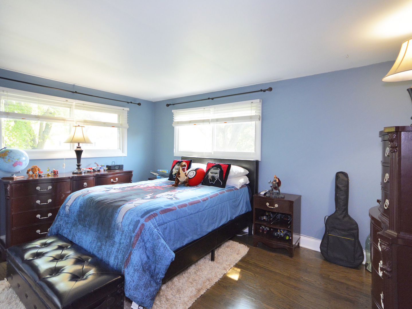 100 Ambleside Road Des Plaines, IL 60016 - Photo 8 of 15 a bedroom with a bed and wooden floor