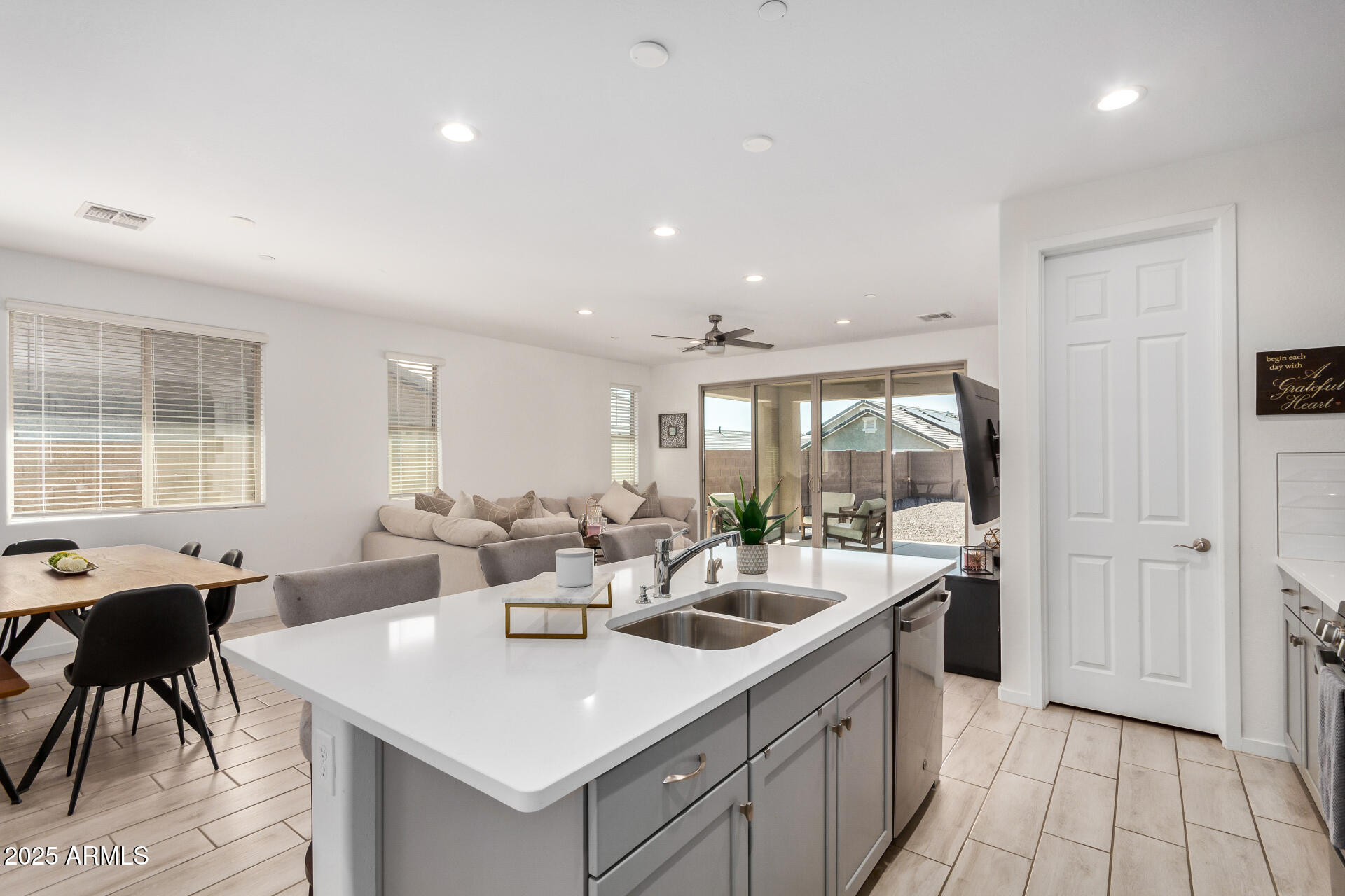 13319 West Red Range Way Peoria, AZ 85383 - Photo 13 of 38 a large kitchen with a large counter top space
