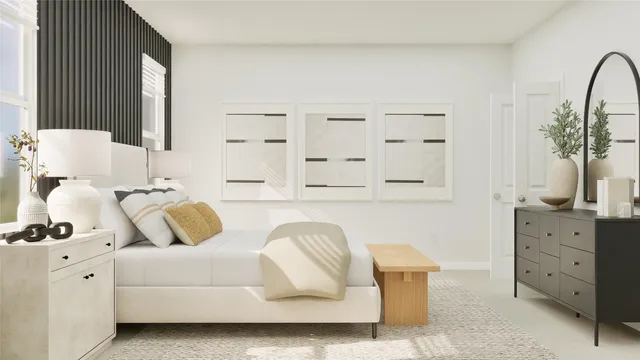 a bedroom with a white bed and dresser with mirror