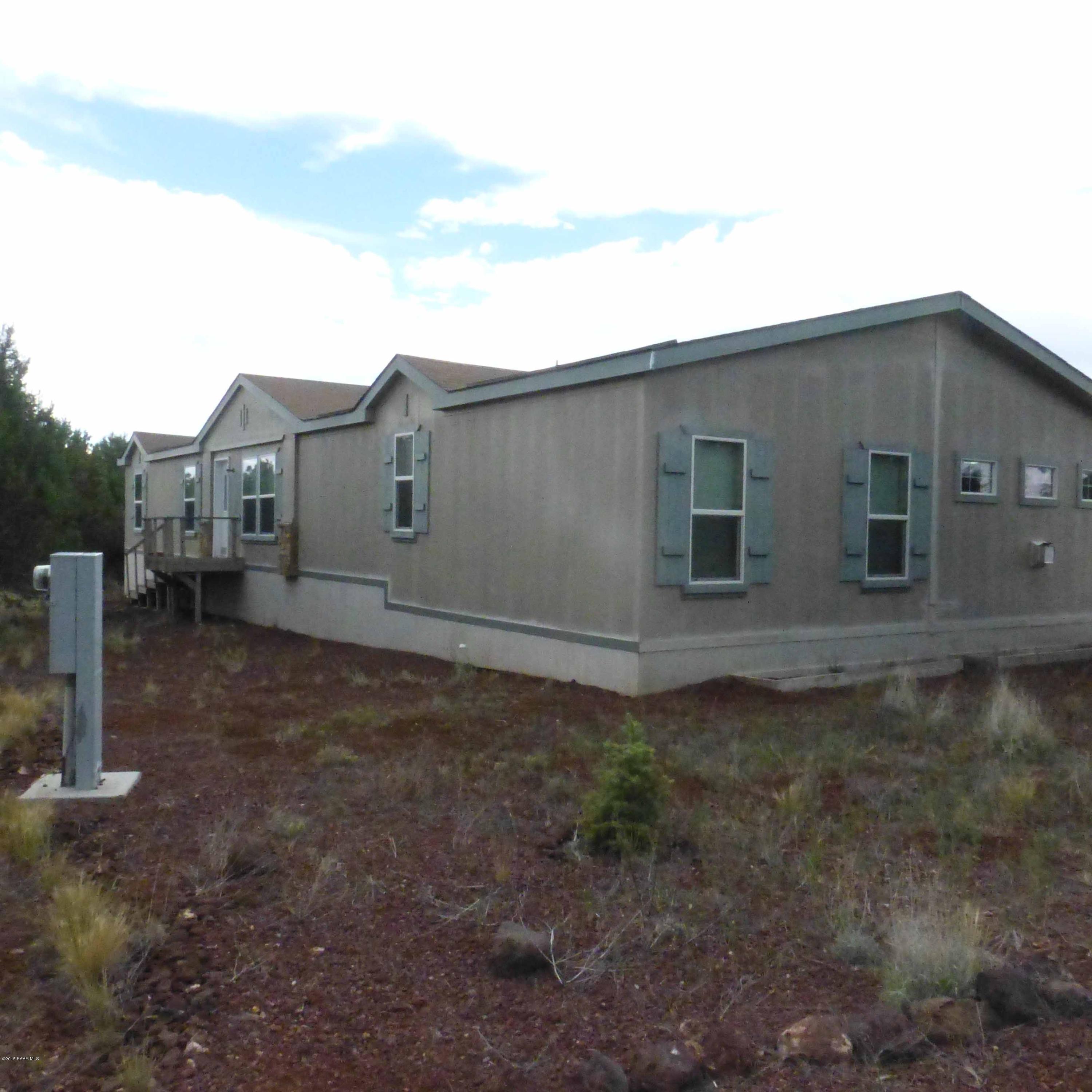 3893 Verde Road Ash Fork, AZ 86320 - Photo 1 of 33 a house view with a outdoor space