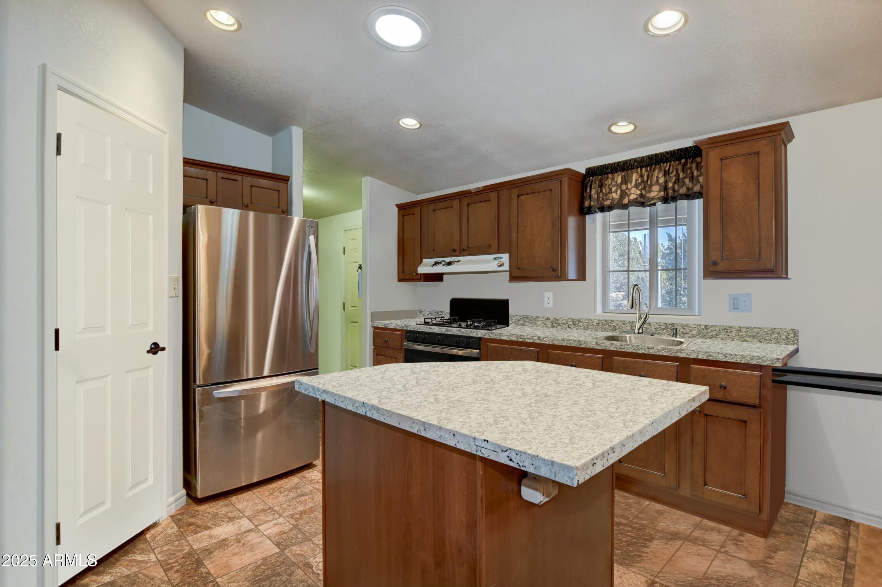 10777 West Raging Crab Road Seligman, AZ 86337 - Photo 10 of 45 Kitchen with marble countertops