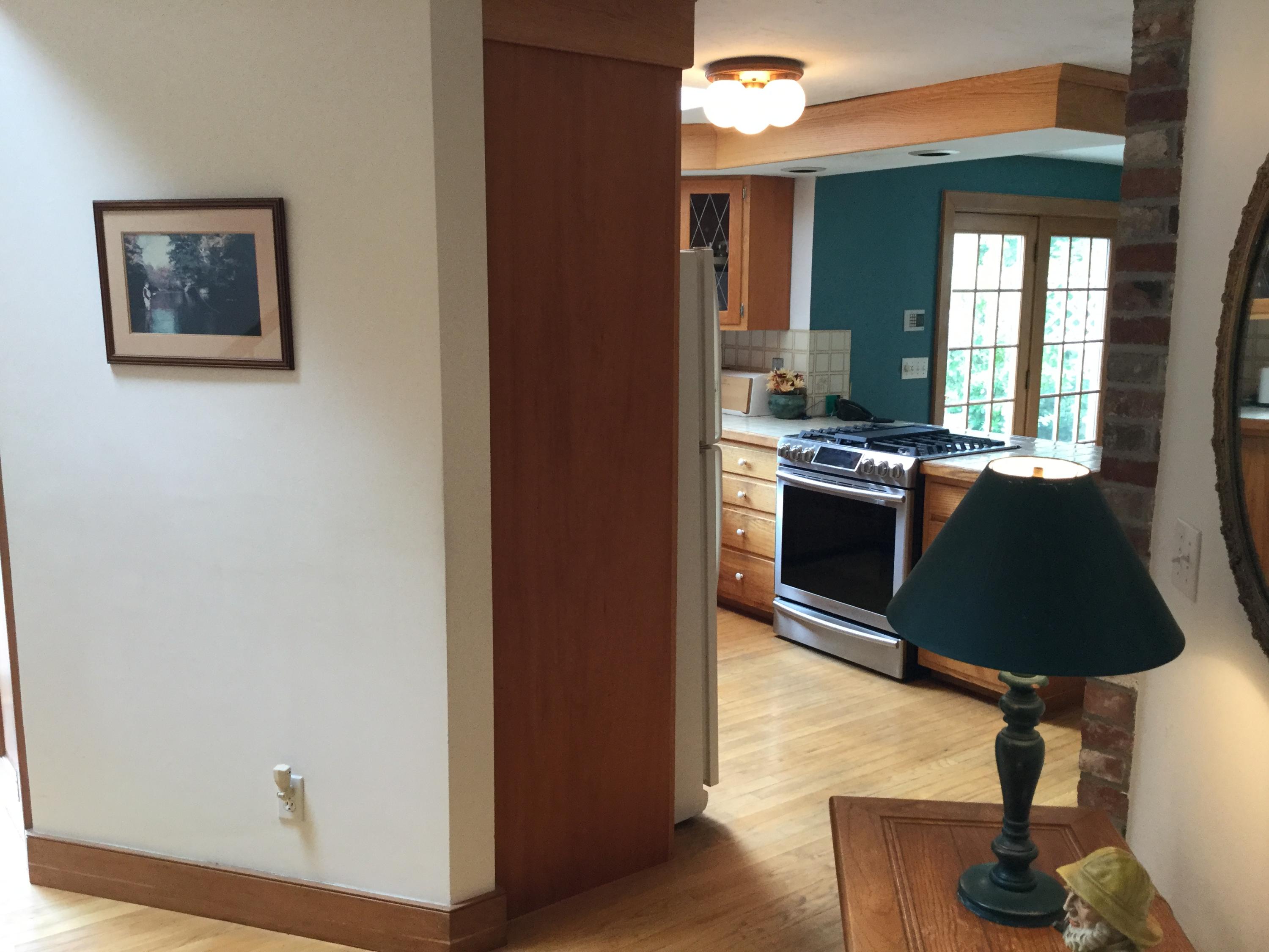 32 Amos Landing Road Mashpee, MA 02649 - Photo 14 of 29 a view of a kitchen with appliances and a window