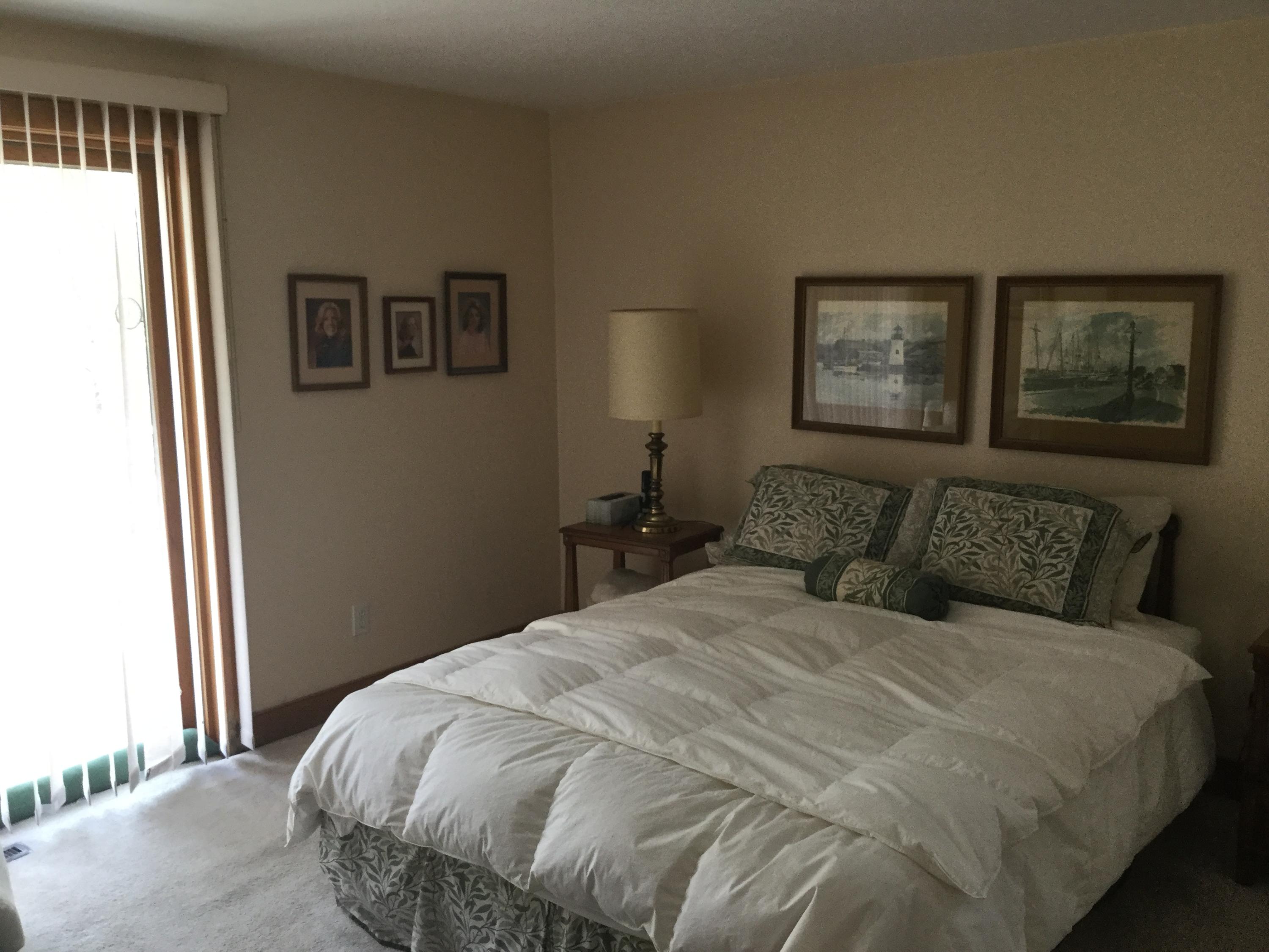 32 Amos Landing Road Mashpee, MA 02649 - Photo 18 of 29 a bedroom with a bed and a window