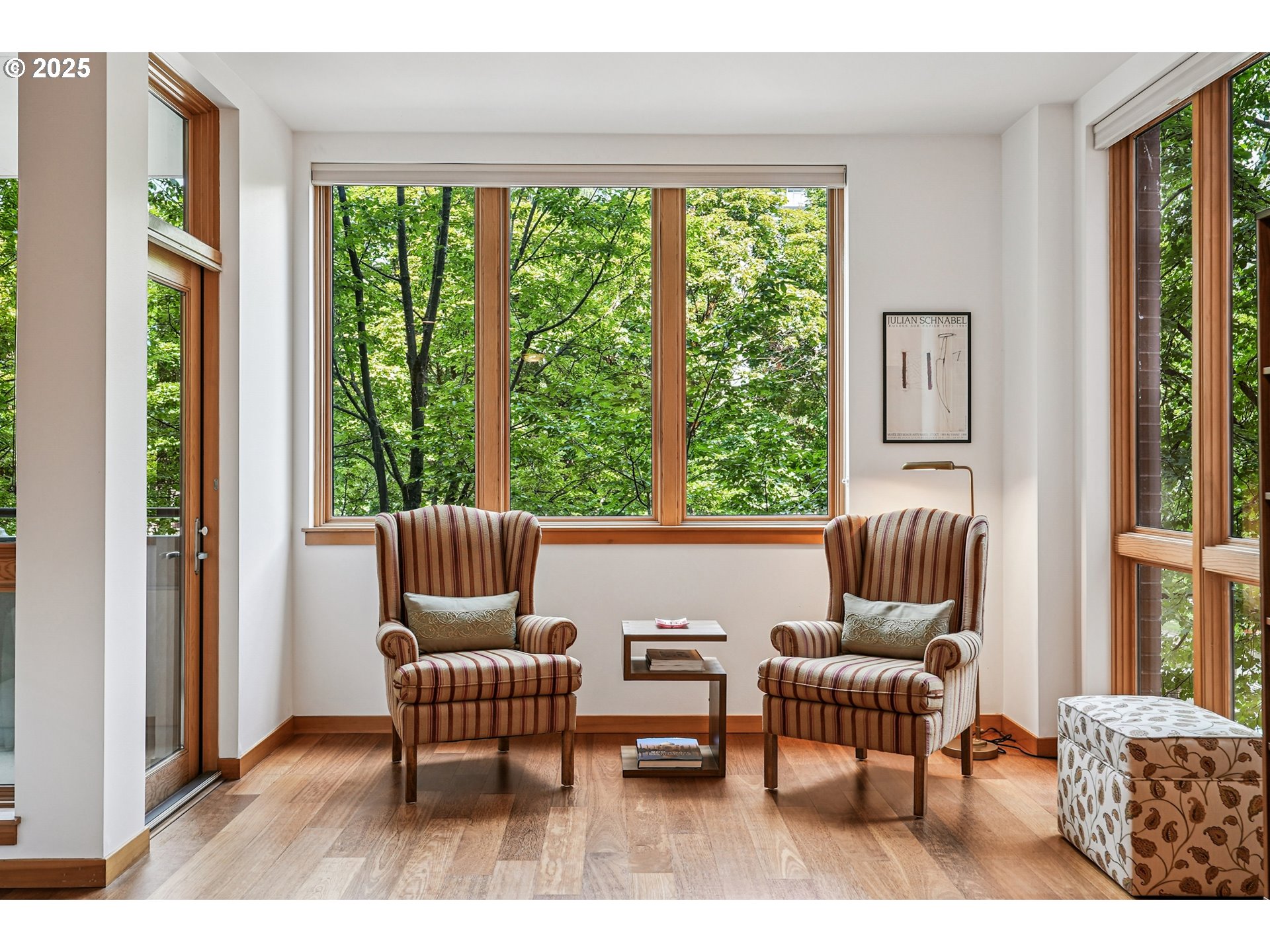 1030 Northwest Johnson Street, Unit 224 Portland, OR 97209 - Photo 11 of 36 a living room with furniture and a window