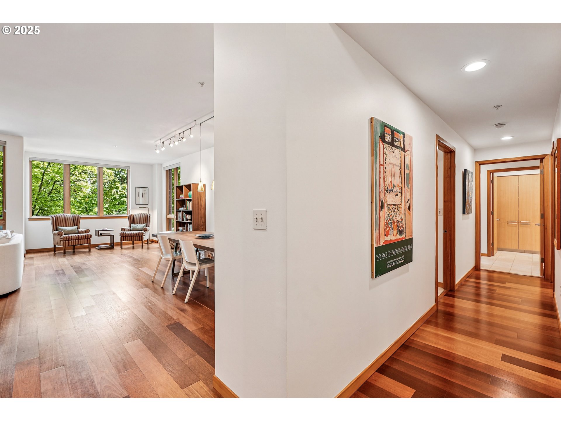 1030 Northwest Johnson Street, Unit 224 Portland, OR 97209 - Photo 16 of 36 a living room with furniture and a wooden floor