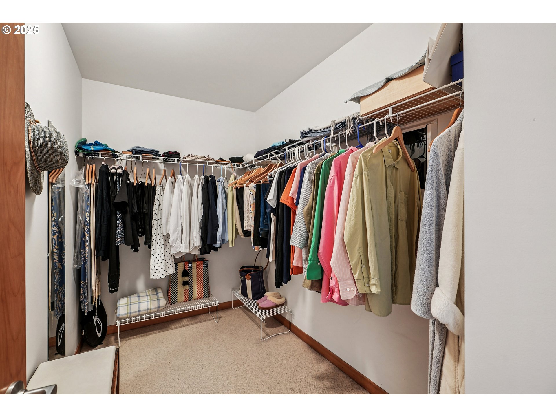 1030 Northwest Johnson Street, Unit 224 Portland, OR 97209 - Photo 19 of 36 a view of walk in closet with clothes