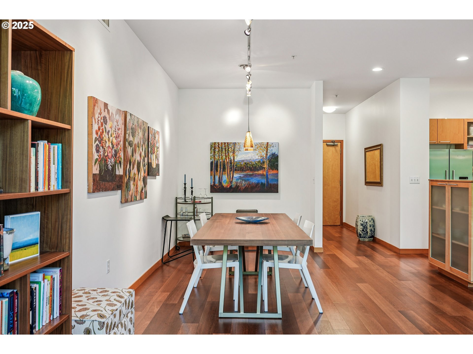 1030 Northwest Johnson Street, Unit 224 Portland, OR 97209 - Photo 9 of 36 a living room with furniture and a flat screen tv
