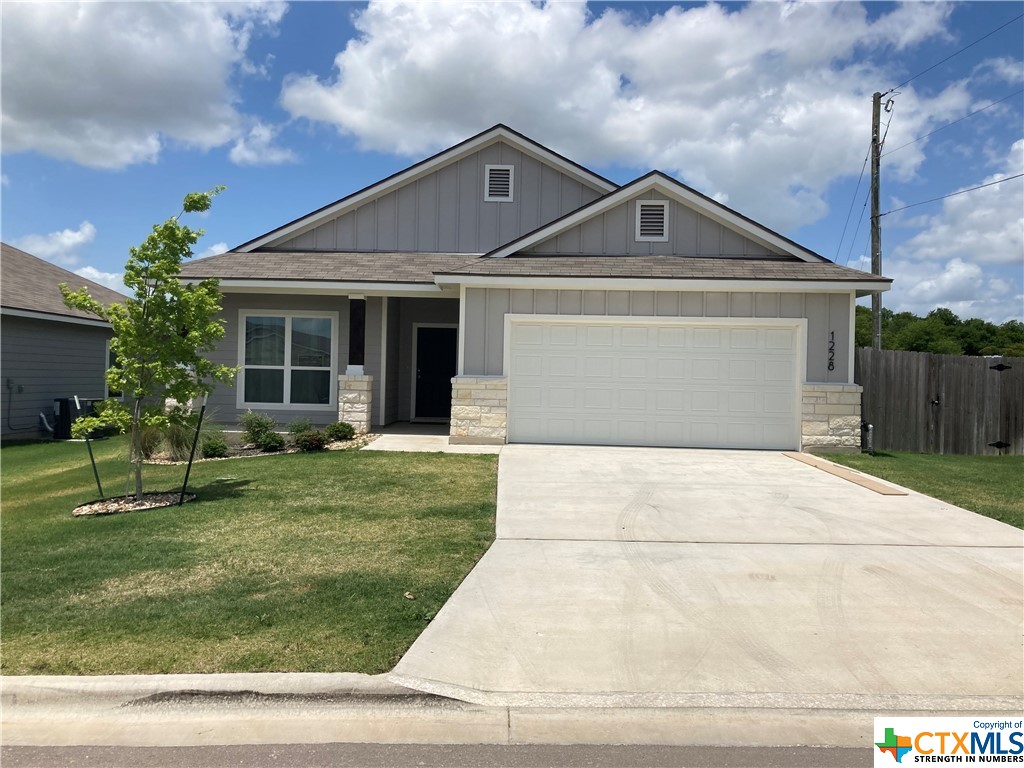 1228 Monte Verde Drive Temple, TX 76504 - Photo 1 of 1 a front view of a house with a yard