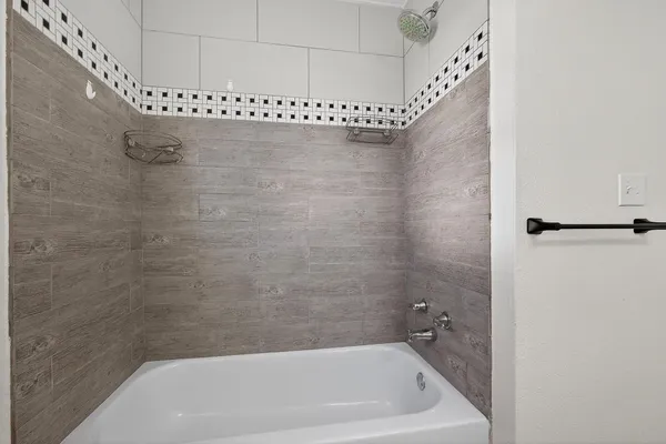 a bathroom with a bathtub