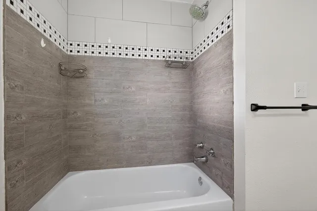 a bathroom with a bathtub